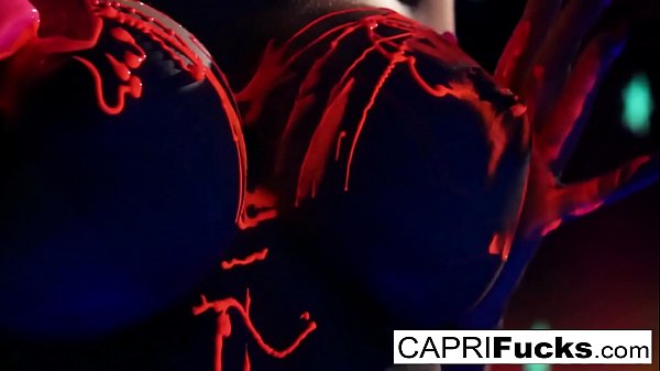 Black-light painted hottie gets a good fucking