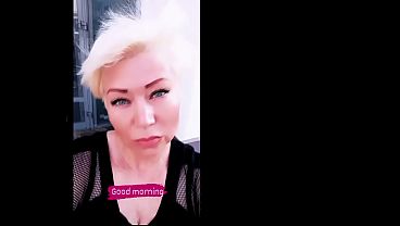 Very close-up shots of a mature slut's pussy with purple hair and other parts of her slutty body...))