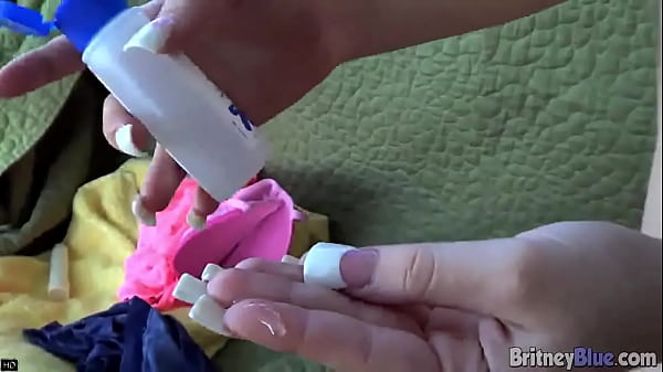 Britney Blue rubbing pussy and using Dildo