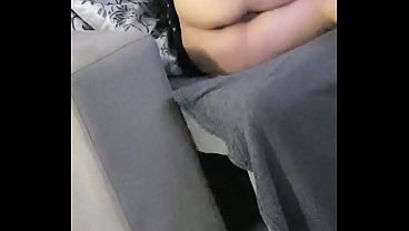 Stepfather films his hot stepdaughter with a white butt alone and without panties in the living room watching TV and using her cell phone. She thought she was alone at home and her half-sister was lying on the bed.