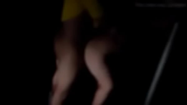 Young girl taking rolls in the middle of the street