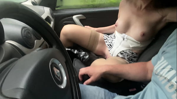 Wife gives a footjob in public