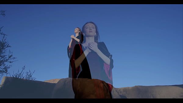 big tits stand on rock and plays