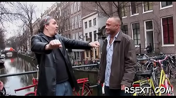 Excited man explores amsterdam