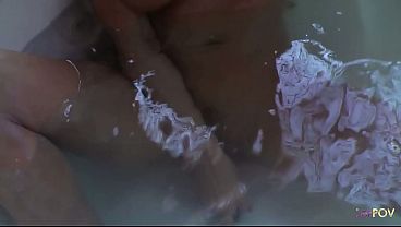 Instead of showering, two busty babes pleased each other with a dildo in the bathtub