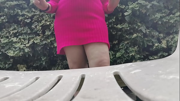 Your beautiful Italian stepmother is wearing a big dirty diaper in a public garden