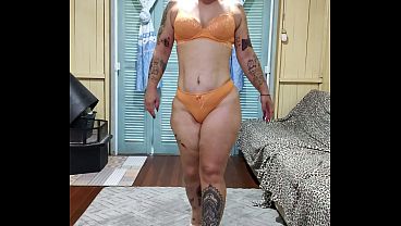 Curious Goddess - A hot girl taking off her lingerie and high heels, showing her ass, hairy pussy, and little feet.