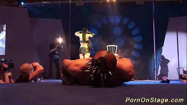 extreme fetish show on public show stage