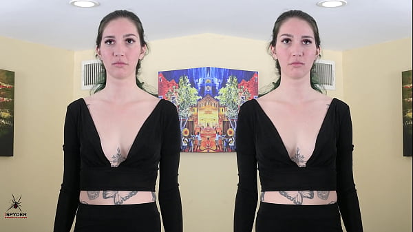 Two piece black outfit deep plunging neck lookshot on Kit Summers