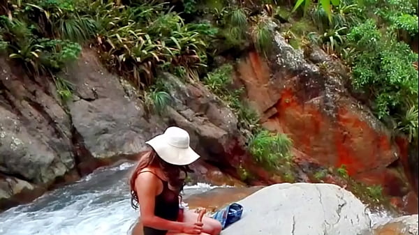 Naked and hot in the river. In the absence of a man
