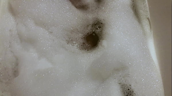 Sexy milf takes a bubble bath