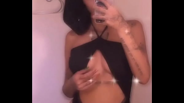 Azzy Hot babe showing off Breasts