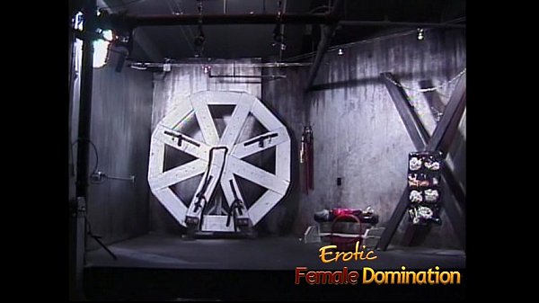 Kinky stud lets a redhead slut pleasure his cock in the dungeon