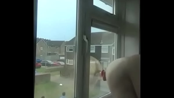 Dildo gets fucked stuck on the window from two ...