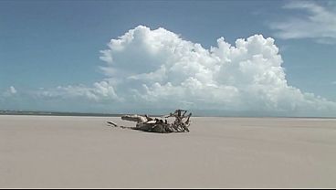 She rides a couple of hard dicks on the beach fucking her in all her holes
