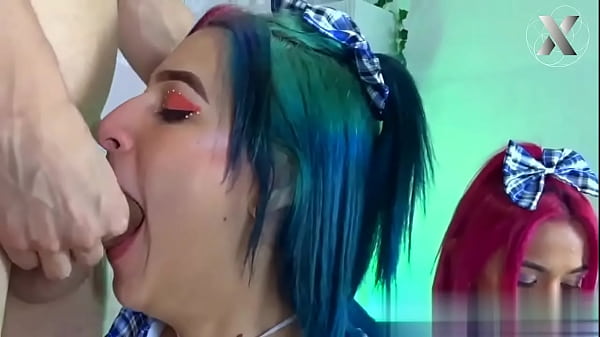 Three amazing girls with colored hair share a b...