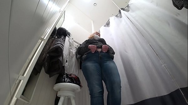 Download Video - A hidden camera in a public fitting room&comma; a fat milf disguises herself&period;