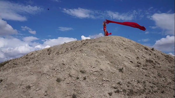 On Top of Hill with Red Flag
