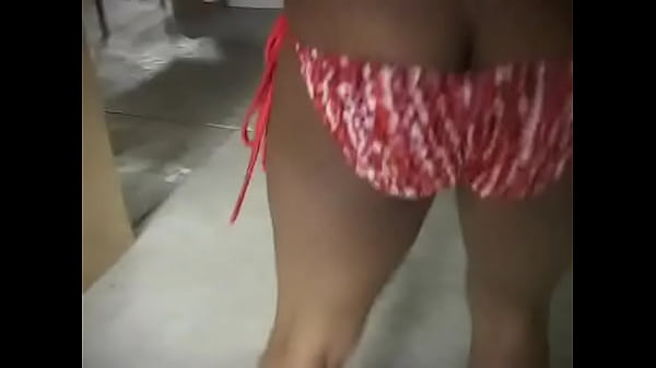 Young sexy chick with olive skin pissing in the toilet, and her boyfriend films