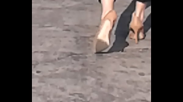 Cute secretary walking in heels