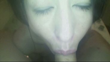 A skinny Japanese milf washes a guy's dick and then blows it in the bathroom and then in the bedroom