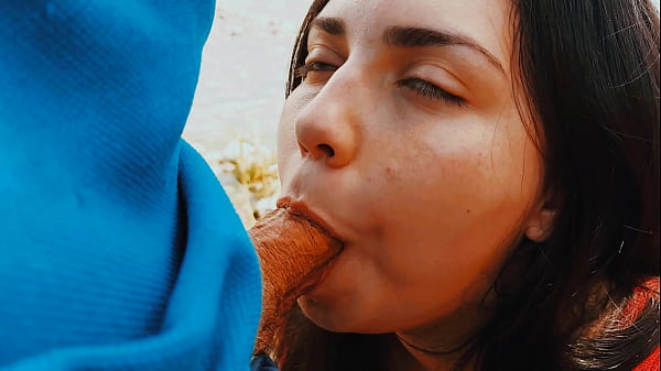 Risky passionate blowjob in nature outdoors