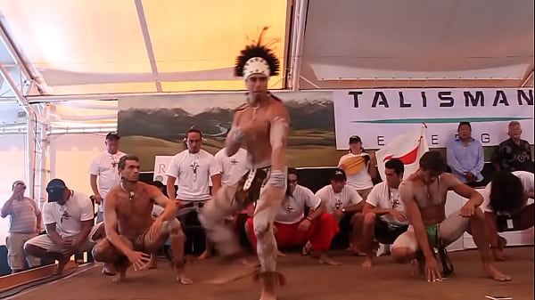 Nearly naked warrior dance