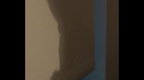 The shadow reflects her sucking his cock
