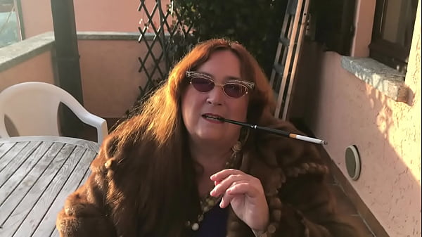 Augusta- A fetish slut dom wife smoker with fur and holder