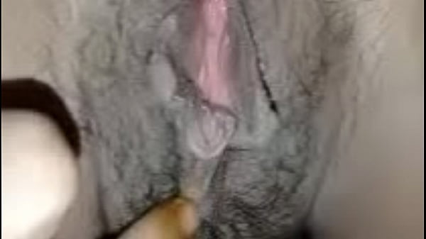 Fucking the pussy of a horny Thai student girl, spreading her pussy open and poking her clit with his dick until he cums.