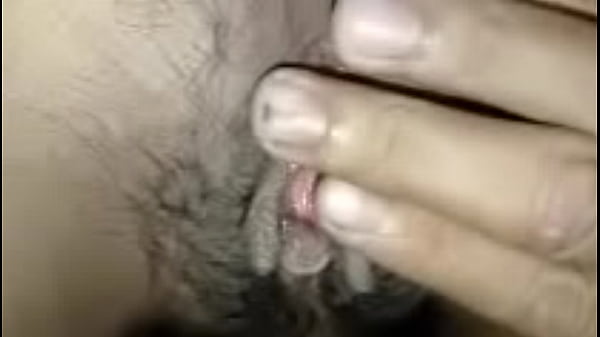 Fucking the pussy of a horny Thai student girl, spreading her pussy open and poking her clit with his dick until he cums.