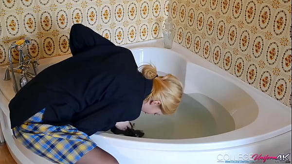Download Video - Drenched Doll Sophia Smith Keeps Her Uniform On While Taking Hot Bath&excl;