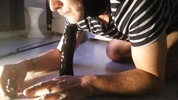 Sucking a dildo under p.