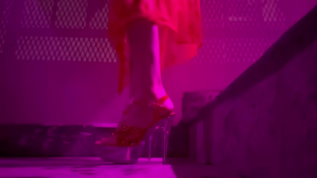 Artemisia Love wearing sexy high heels and smoking a cigarette outdoor