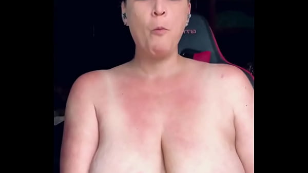 Eating pizza with my titties out.