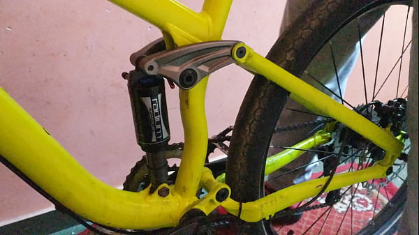 Young man passionately bounces on his petite mountainbike