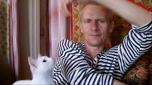 Victor is at home with a cat and a dog
