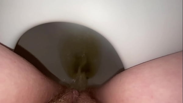 pissing with a fart at the end!