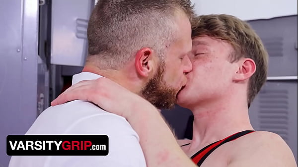 Download Video - Varsity Grip - Hunk Coach Brian Bonds Bends Over In And Takes Young Dick In The Locker Rooms