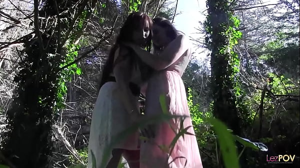 Two lesbian naturals using a sex toy and a dildo as they fuck under the sun
