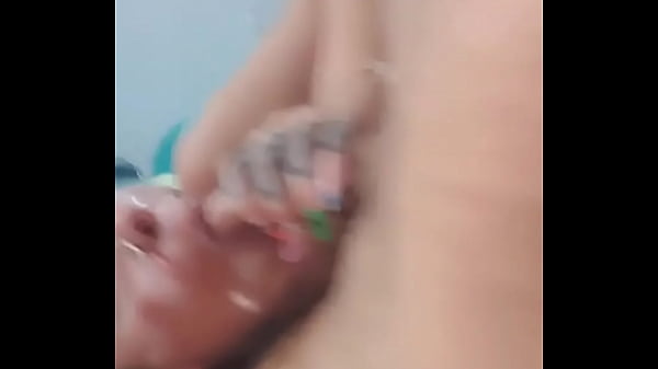 Passing the tongue on the head of the dick slowly and sucking with desire