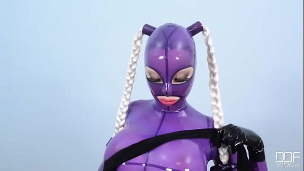 She Looms in Latex