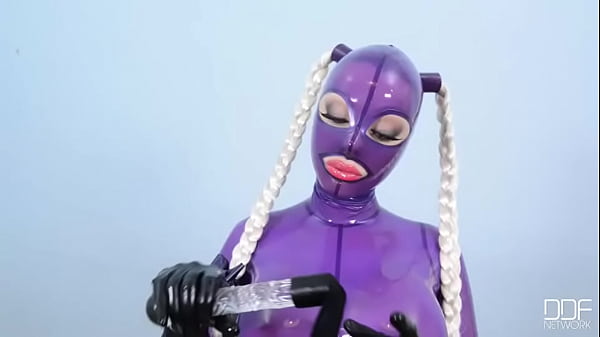 She Looms in Latex