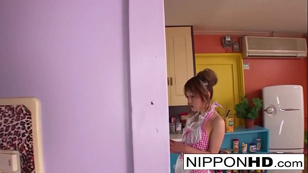Japanese cutie gives a blowjob in the kitchen