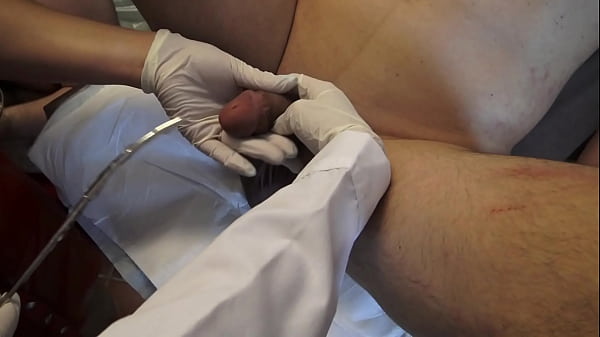 Dr. Amrita and Nurse Alyia test two of their slaves with n and urethral dilation.