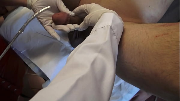 Dr. Amrita and Nurse Alyia test two of their slaves with n and urethral dilation.