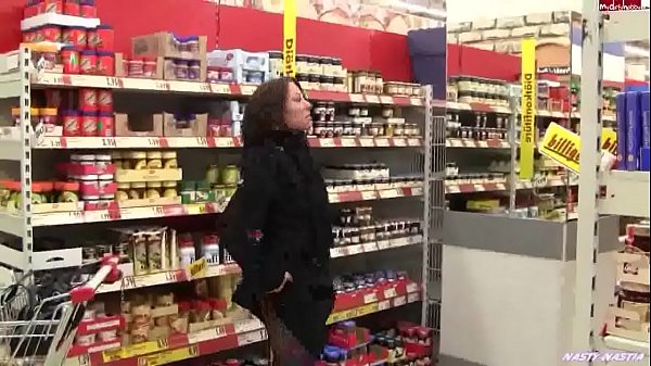 woman sticks plug up her ass inside the supermarket
