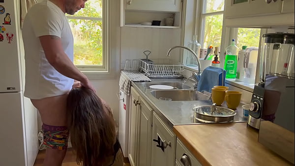 Doggy while doing the dishes