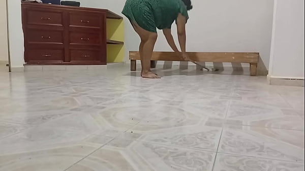Chubby neighbor cleaning her new apartment
