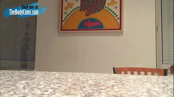 Lovely camgirl playing with dildo in kitchen